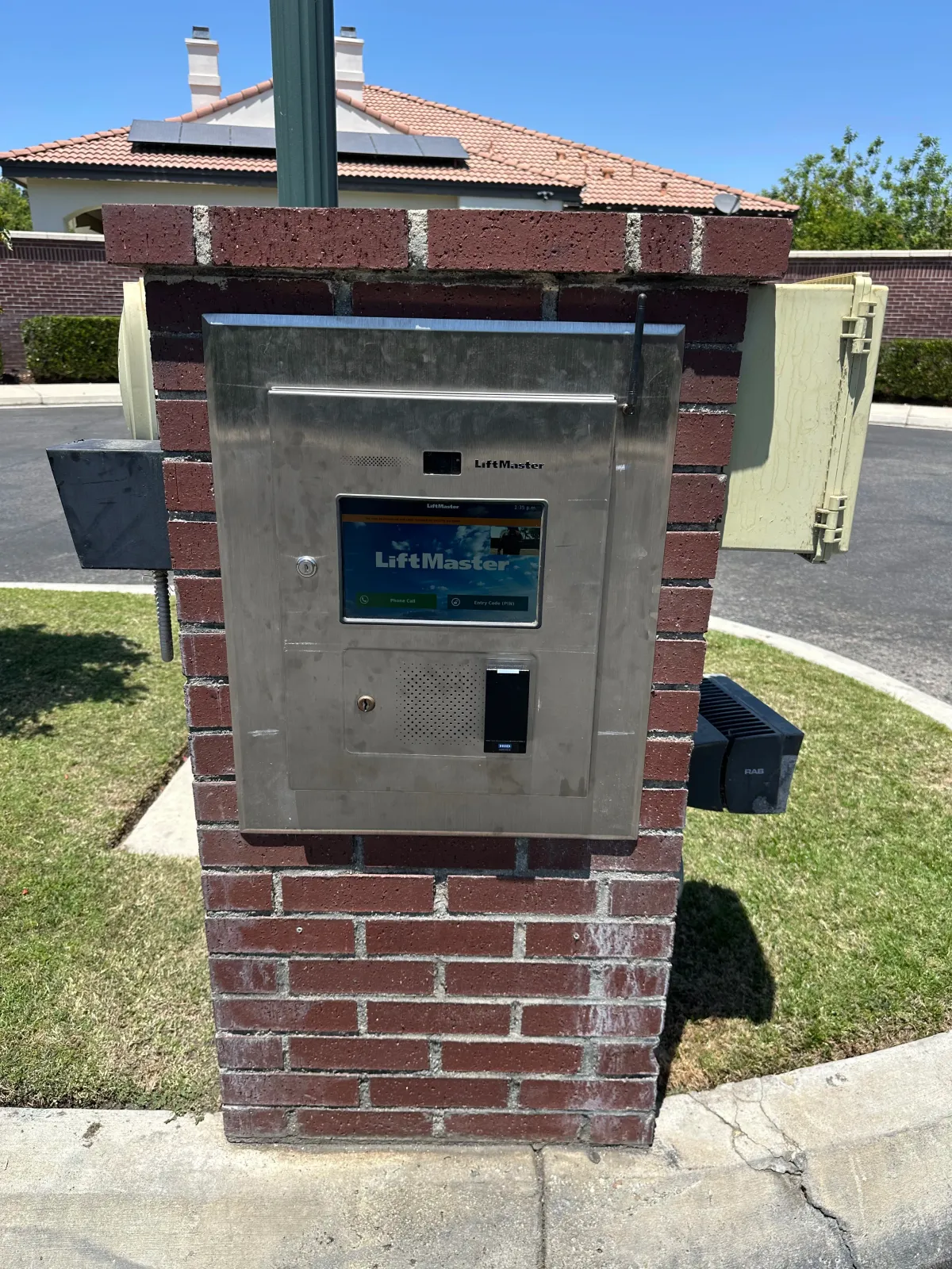 Completed LiftMaster gate entry system at a gated community in Bakersfield CA